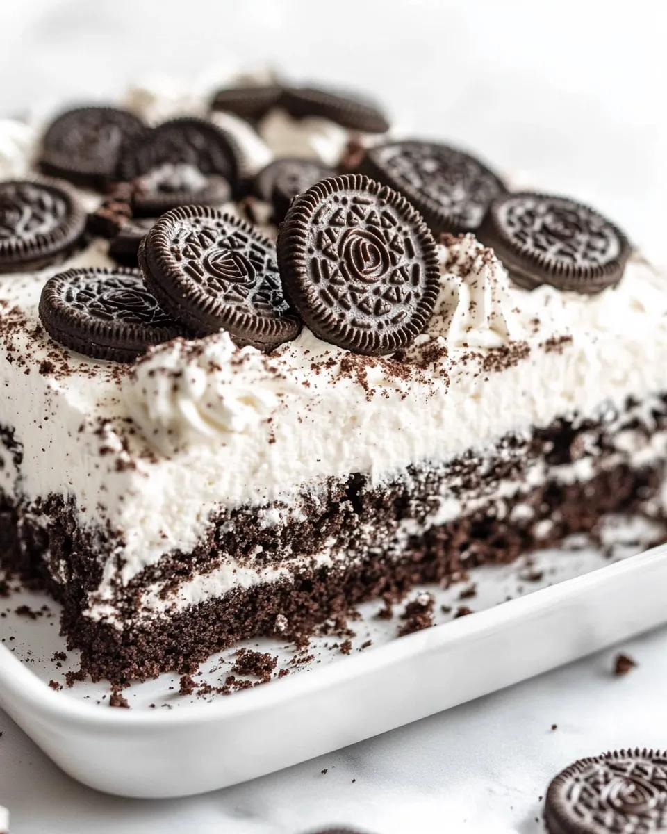 Easy Oreo Cake (Creamy Oreo Poke Cake) food shot
