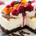 Homemade Raspberry Apricot Cheesecake with Chocolate Crust photo
