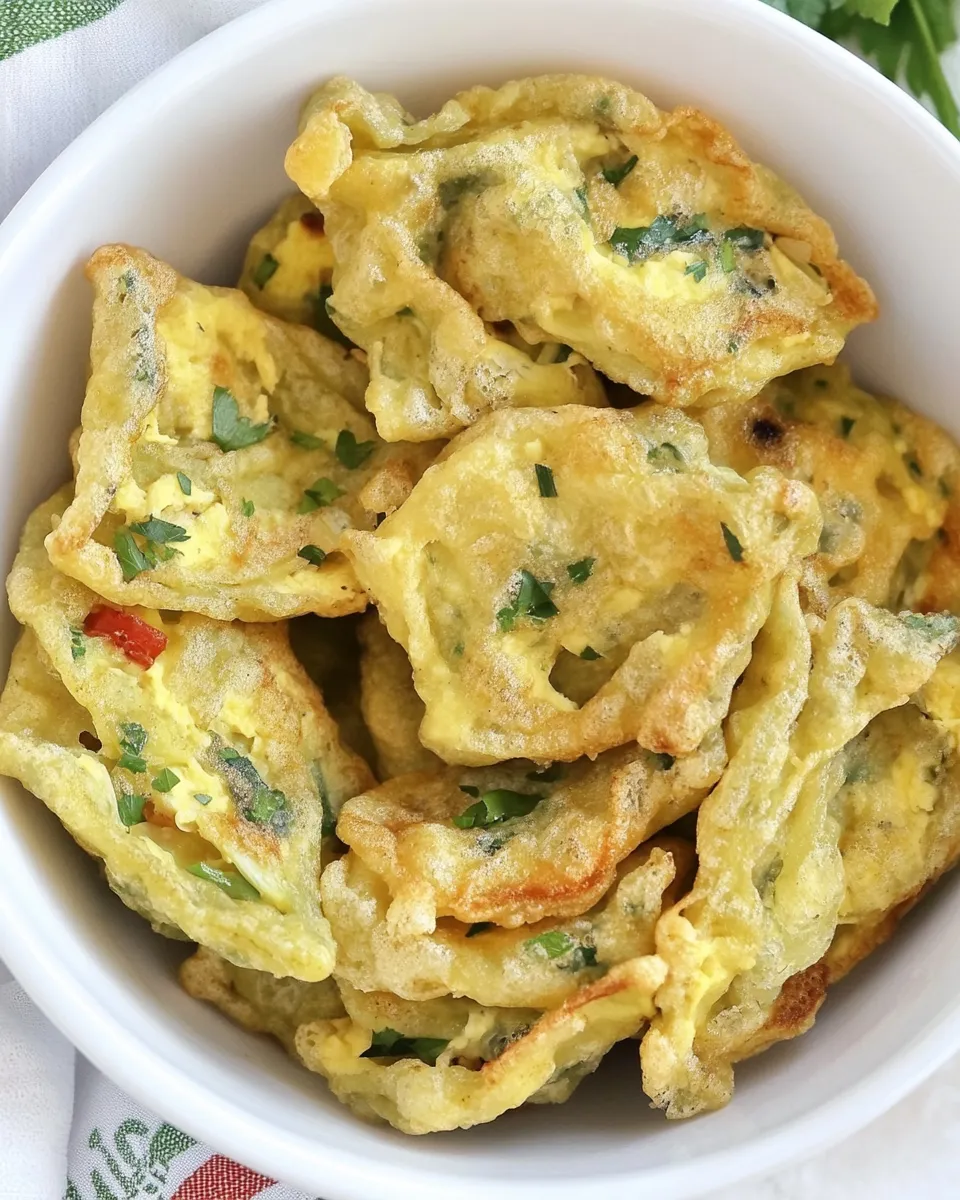 Delicious Gebratene Maultaschen (Fried Maultaschen with Egg) food shot