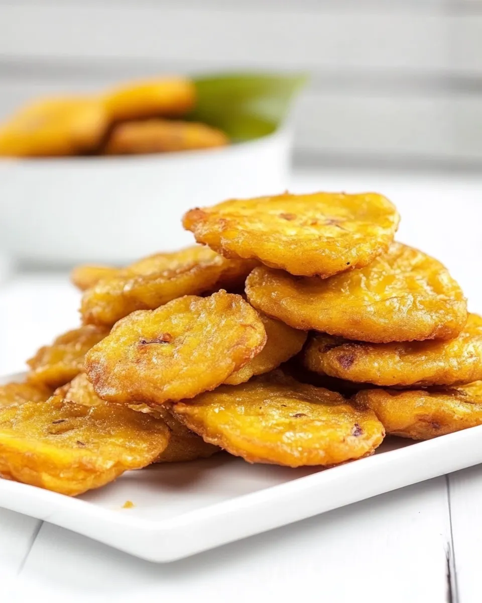 Delicious Tostones: Fried Green Plantains shot