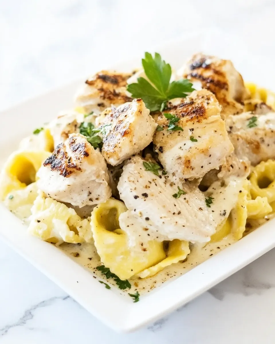 Classic Asiago Tortellini Alfredo with Grilled Chicken recipe image