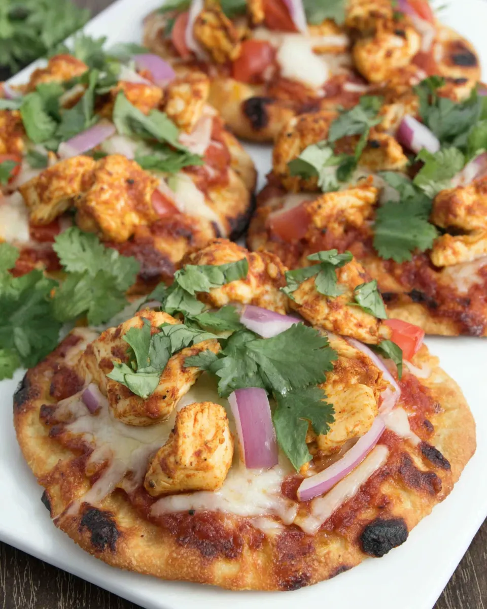 Classic Chicken Tikka Pizzas recipe image
