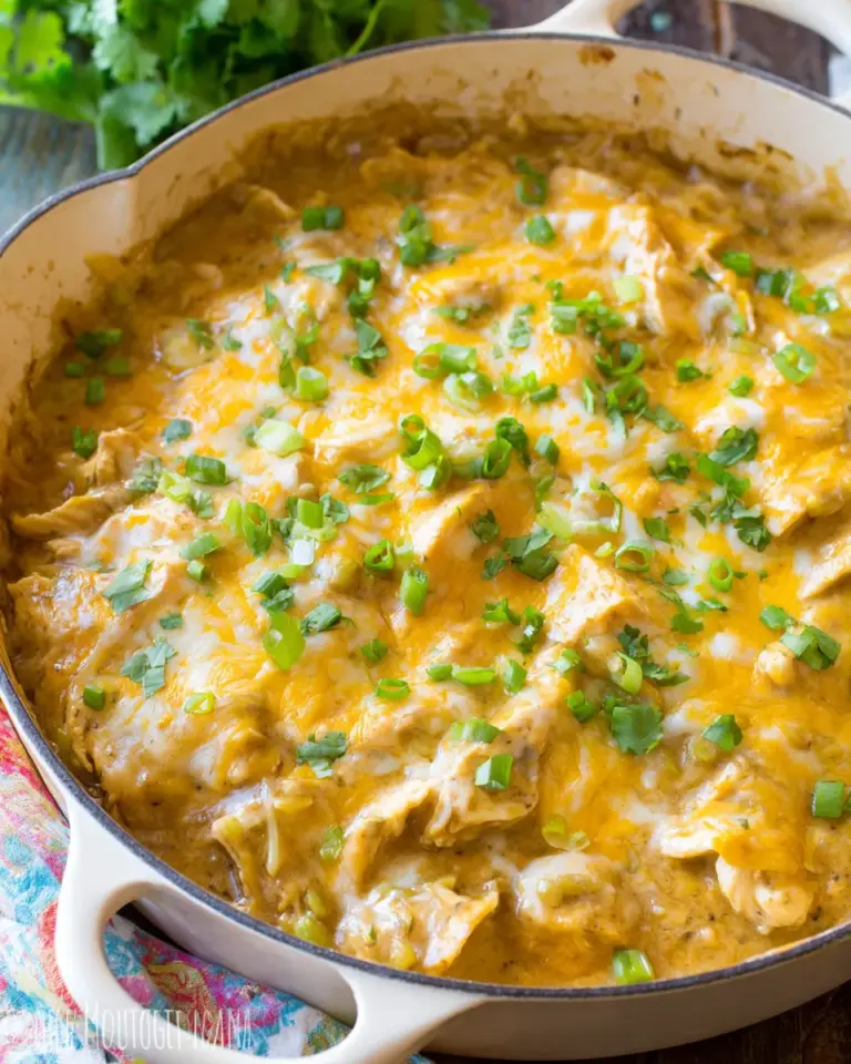 Delicious Creamy Green Chile Chicken Enchilada Skillet food shot