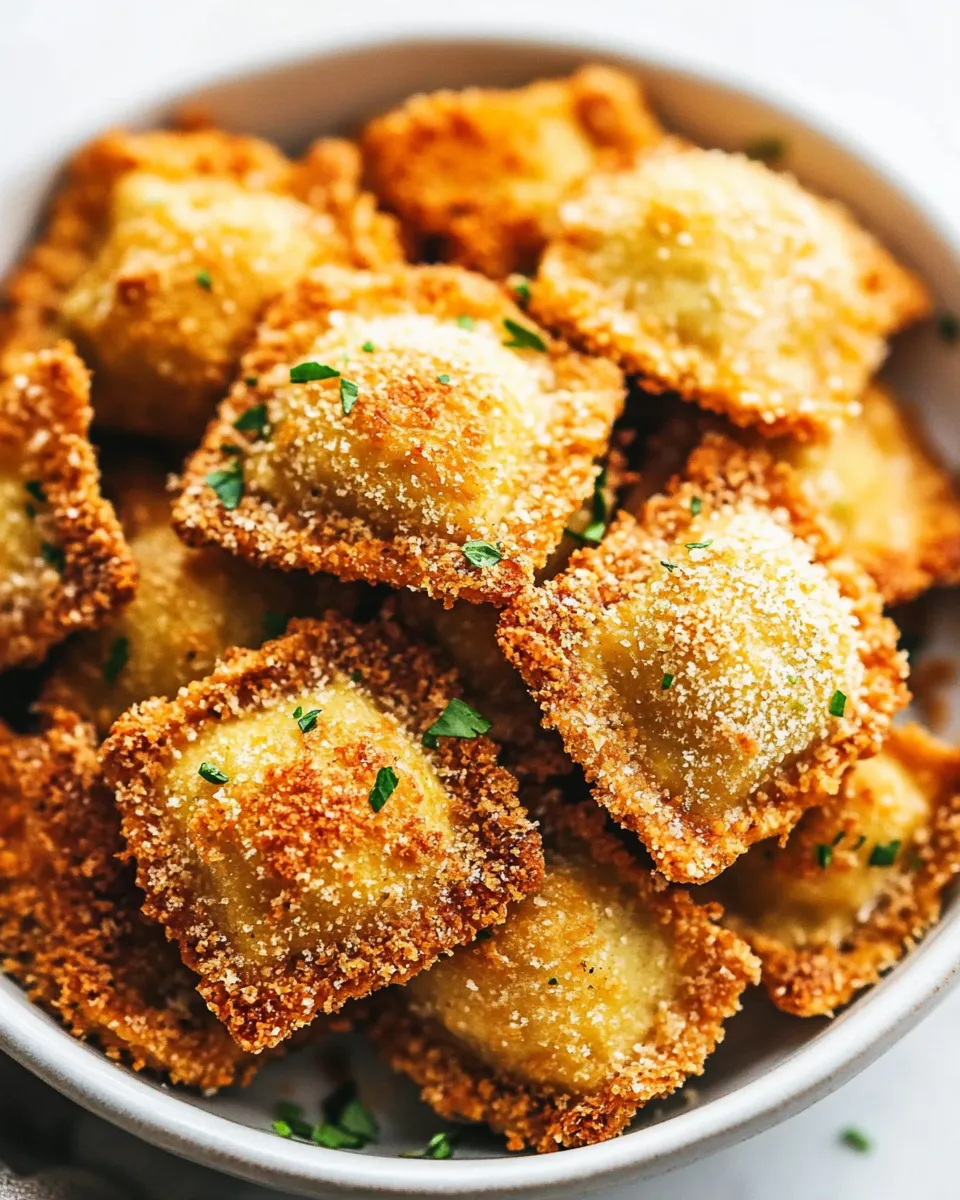 Delicious Crispy Baked Parmesan Ravioli plate image