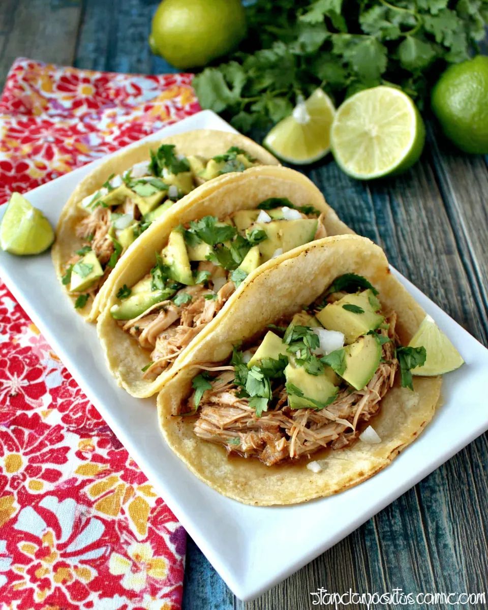 Delicious Slow Cooker Salsa Verde Chicken Tacos shot