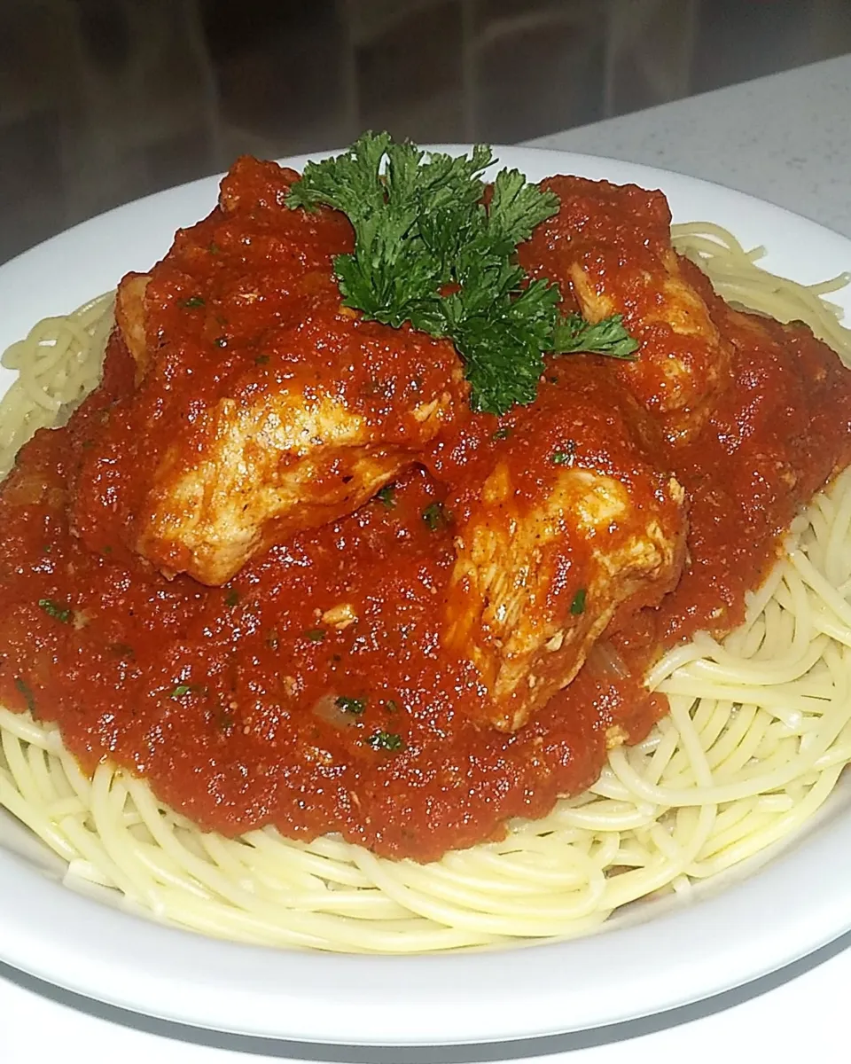 homemade Spaghetti Rigati with Chicken and Tomato Sauce photo