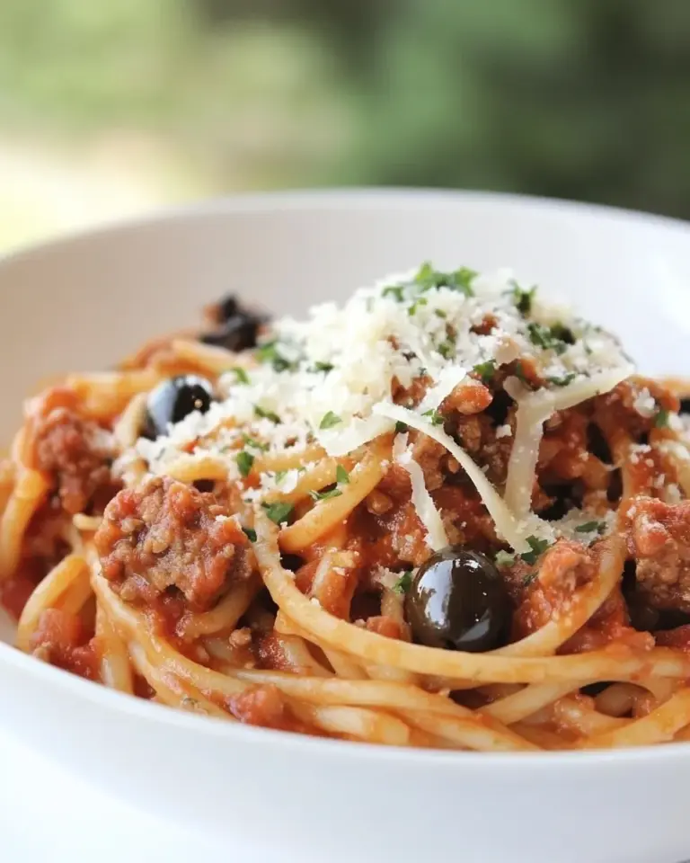 Homemade Spaghetti with Italian Sausage and Olives photo